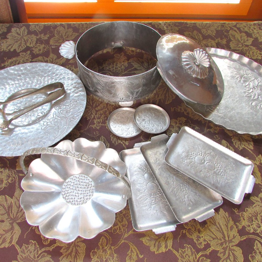11 Pieces of Vintage Hand Forged Aluminum. Variety of Patterns